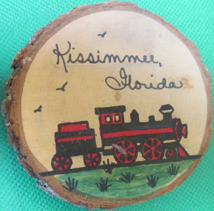 Souvenir KISSIMMEE, FL Nature's Woodrounds refrigerator magnet