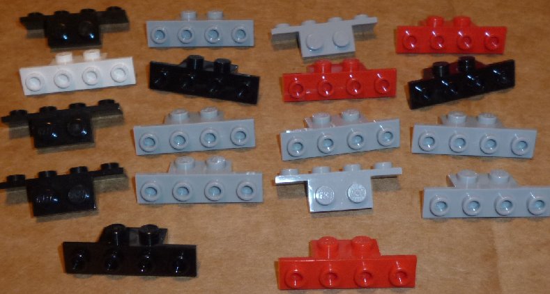 LEGO Parts lot of 18 Bracket 1 x 2 - 1 x 4, m‪ixed colors - Click Image to Close