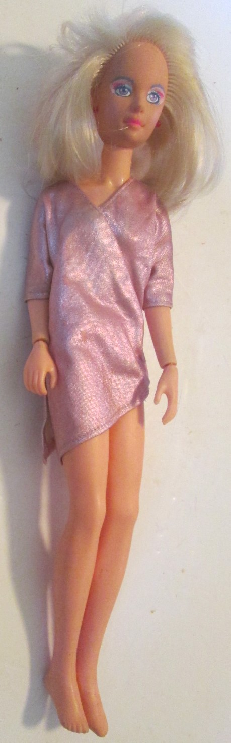 Vintage 1980s Hasbro JEM Doll wearing dress