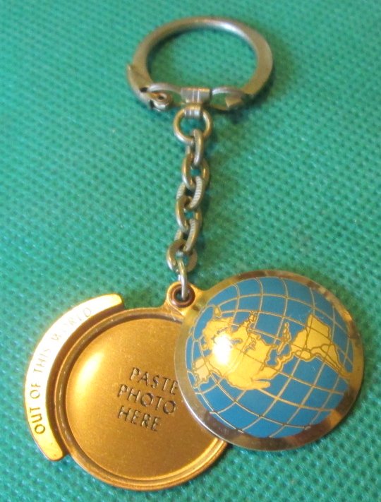 Vintage metal OUT OF THIS WORLD keyring key chain 1.5"