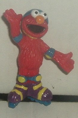 SESAME Street ELMO PVC Figure rollerskating